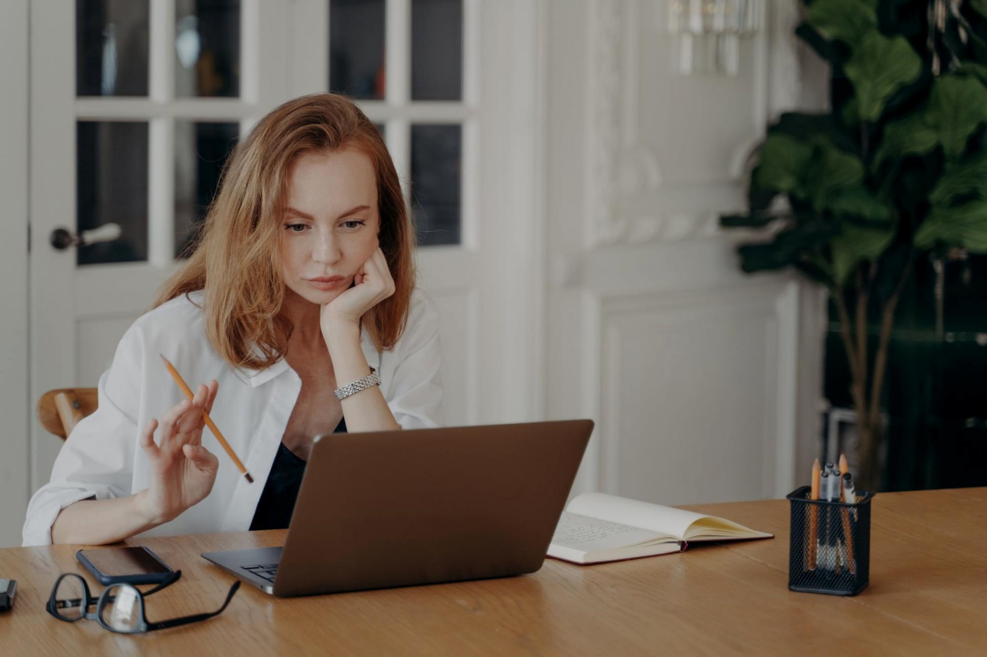 Financial analysis session showing variance reports and allocation schedules being reviewed